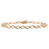 Estate: 10K Yellow Gold Diamond Infinity Bracelet 1/2CTW
